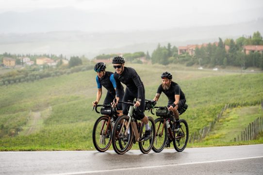 cyclists on the first road climb of the via francigena bike tour